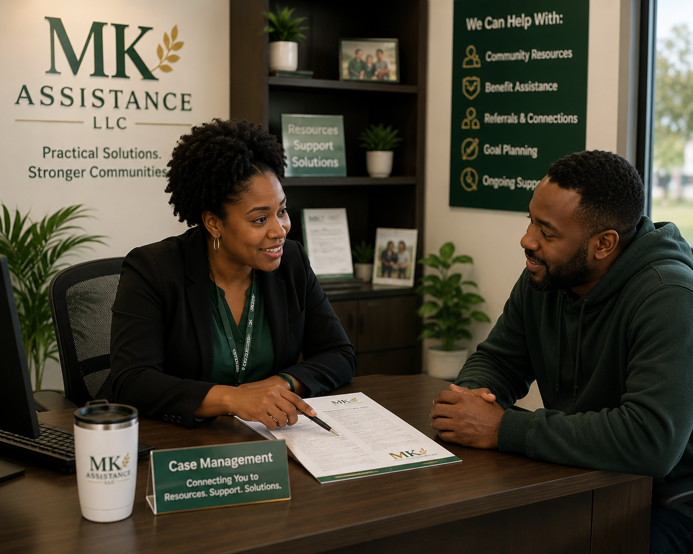 Case manager helping a client connect with community resources.